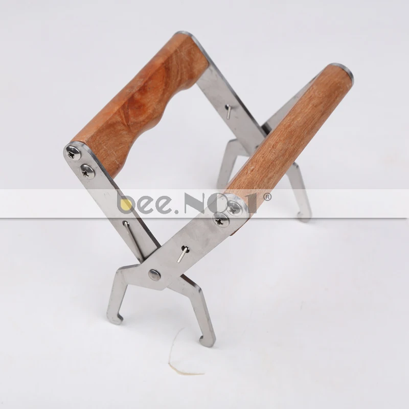 1PC Professional Wooden Handle BeeHive Frame Holder with Lifter Grip Bee Frame Beekeeping Equipment
1PC Professional Wooden Handle BeeHive Frame Holder with Lifter Grip Bee Frame Beekeeping Equipment