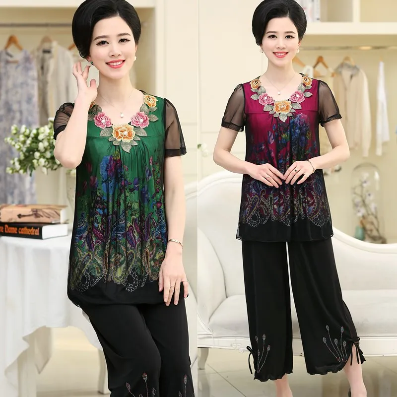 XL-7XL Middle women summer dress loose suit Women short-sleeved wide-leg pants 2 sets large size embroidered shirt + pants suit
XL-7XL Middle women summer dress loose suit Women short-sleeved wide-leg pants 2 sets large size embroidered shirt + pants suit