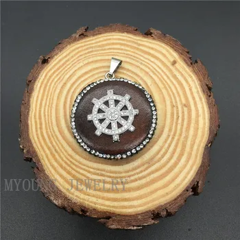 MY1144 Round Wood Pendant With Rhinestone Paved edges And CZ Micro paved Rudder front
MY1144 Round Wood Pendant With Rhinestone Paved edges And CZ Micro paved Rudder front