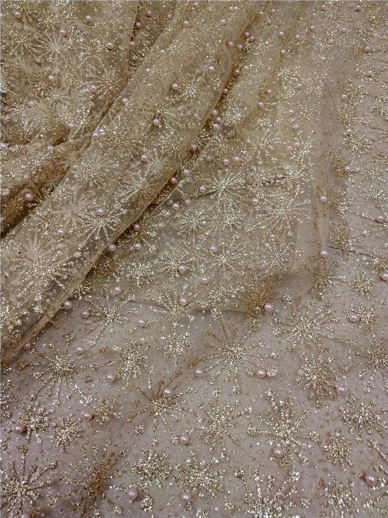 Shinny african glitter tulle fabric sparkly YG-325 glued glitter lace fabric with pearls for fashion show or wedding dress
Shinny african glitter tulle fabric sparkly YG-325 glued glitter lace fabric with pearls for fashion show or wedding dress