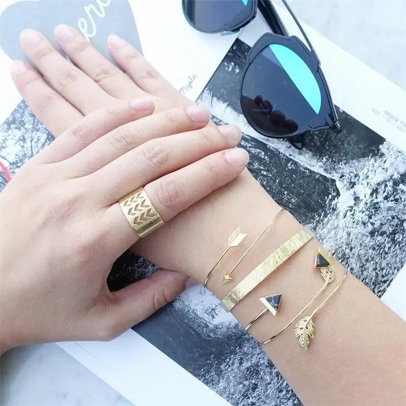 Female bracelet Bohemian Arrow Leaves Open Triangle Crack Gold Bracelets Ring Combination Lady Fashion Dance Party Jewelry
Female bracelet Bohemian Arrow Leaves Open Triangle Crack Gold Bracelets Ring Combination Lady Fashion Dance Party Jewelry