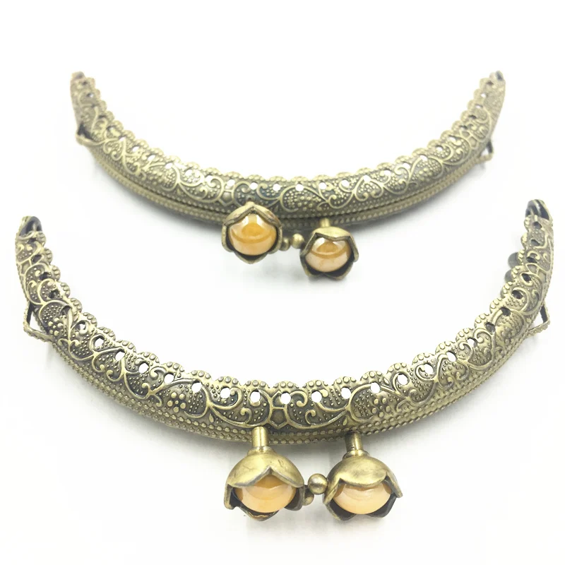 Bronze Tone Metal Purse Frame Handle Yellow Resin Glue Arch Pattern Ruffled Lotus Head Kiss Clasp Luggage&Bag Accessories 10.5CM
Bronze Tone Metal Purse Frame Handle Yellow Resin Glue Arch Pattern Ruffled Lotus Head Kiss Clasp Luggage&Bag Accessories 10.5CM