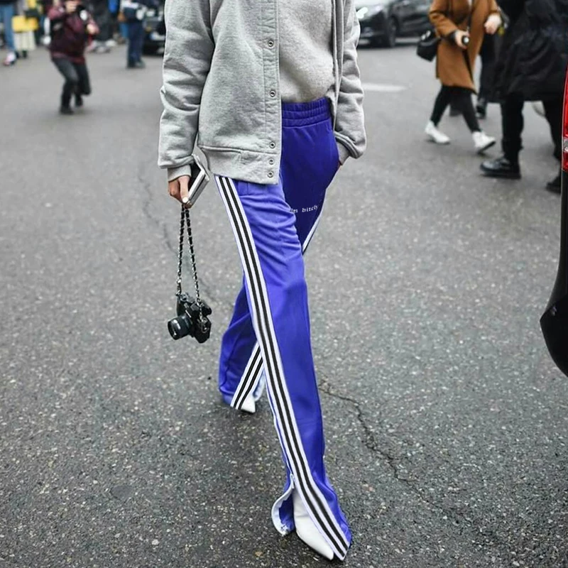 The same side of the ribbon with the letter casual zipper split wild trousers female
The same side of the ribbon with the letter casual zipper split wild trousers female