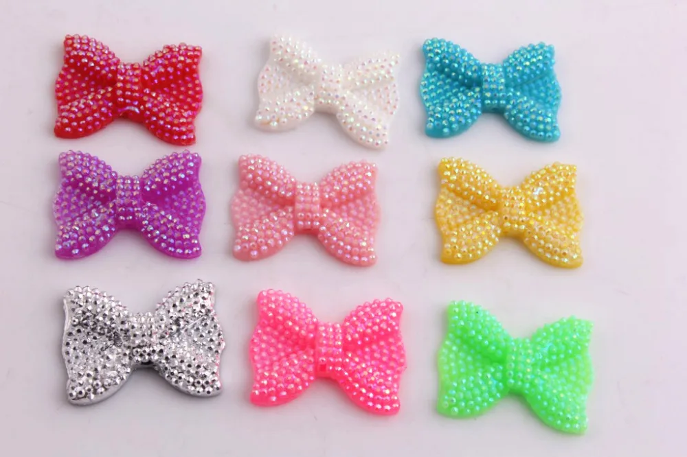 OYKZA High Quality Middle Vertical Hole 21x28MM Shinny Resin Rhinestone Bows Beads for Kids Chunky Jewelry 100PCS A Lot
OYKZA High Quality Middle Vertical Hole 21x28MM Shinny Resin Rhinestone Bows Beads for Kids Chunky Jewelry 100PCS A Lot