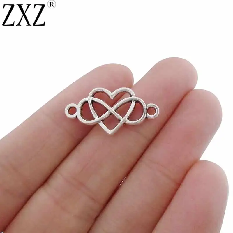 ZXZ 10pcs Antique Silver Tone Infinity Heart Connector Charms Double Sided for Bracelet Jewelry Making Findings 25x13mm
ZXZ 10pcs Antique Silver Tone Infinity Heart Connector Charms Double Sided for Bracelet Jewelry Making Findings 25x13mm