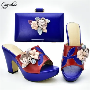 Hot sale royal blue high heel slip-on pump shoes with evening bag set with nice flower 333-1, heel height 10.5cm
Hot sale royal blue high heel slip-on pump shoes with evening bag set with nice flower 333-1, heel height 10.5cm