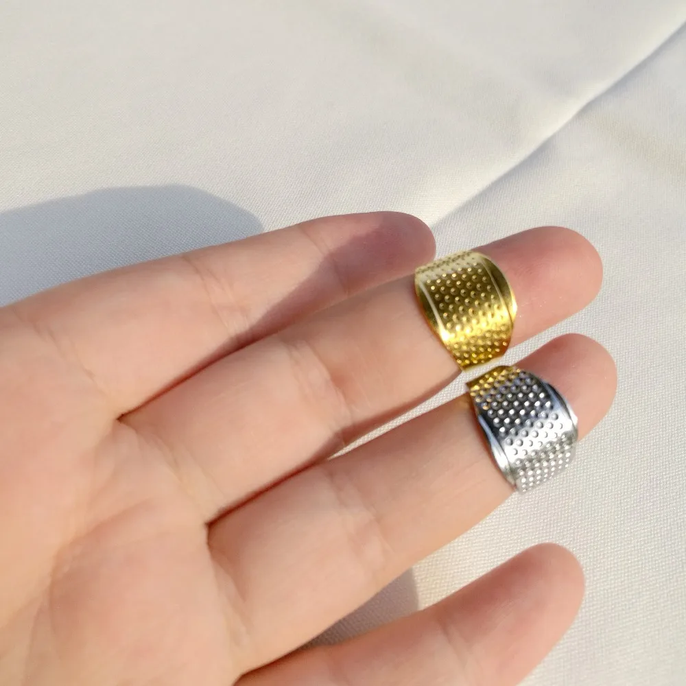 2pcs/lot thimble adjustable stitch needle hoop ring gold silver color cross stitching Craft sewing DIY needlework set plus
2pcs/lot thimble adjustable stitch needle hoop ring gold silver color cross stitching Craft sewing DIY needlework set plus