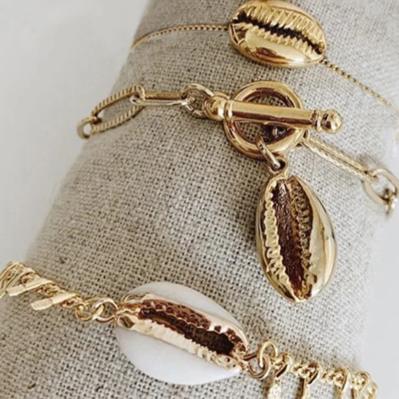 New Fashion Gold Color Metal Sheets Cowrie Shell Bracelet for Women Tassel Bead Charm Bracelet Bohemia Jewelry 2019
New Fashion Gold Color Metal Sheets Cowrie Shell Bracelet for Women Tassel Bead Charm Bracelet Bohemia Jewelry 2019