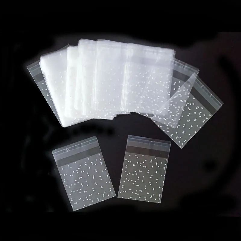 100pcs / Set White Polka Dot Plastic Christmas Gift Bag Transparent Frosted OPP Birthday Wedding Cookies Candy Packaging
100pcs / Set White Polka Dot Plastic Christmas Gift Bag Transparent Frosted OPP Birthday Wedding Cookies Candy Packaging