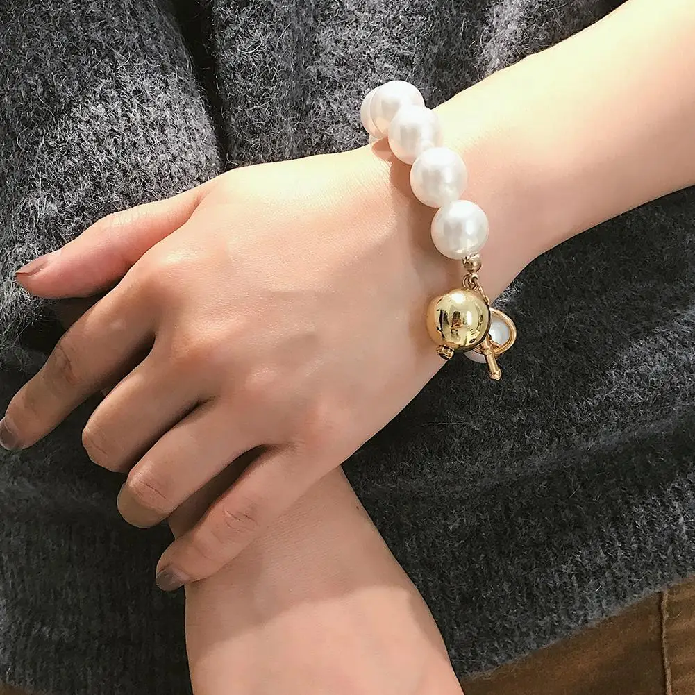 Wholesale Fashion Simple Women Big Faux Pearl Ball Dangle Pendant Bracelet Jewelry Decor
Wholesale Fashion Simple Women Big Faux Pearl Ball Dangle Pendant Bracelet Jewelry Decor
