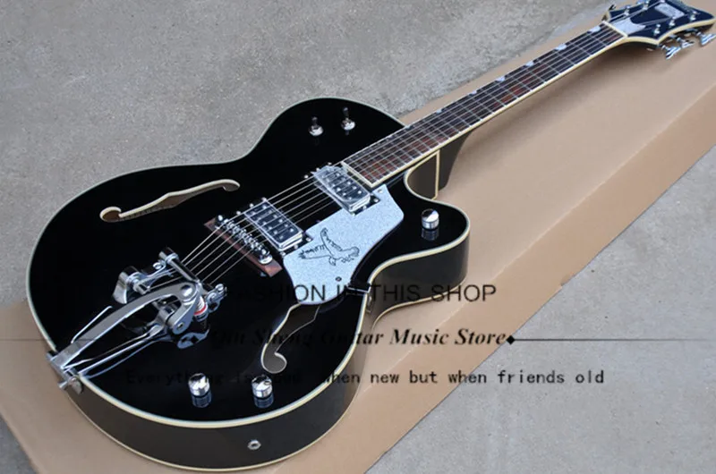 black Semi-hollow Electric Guitar with Tremolo System,Silver powder Pickguard,Chrome Hardwares,Offer Customized,free shipping
black Semi-hollow Electric Guitar with Tremolo System,Silver powder Pickguard,Chrome Hardwares,Offer Customized,free shipping