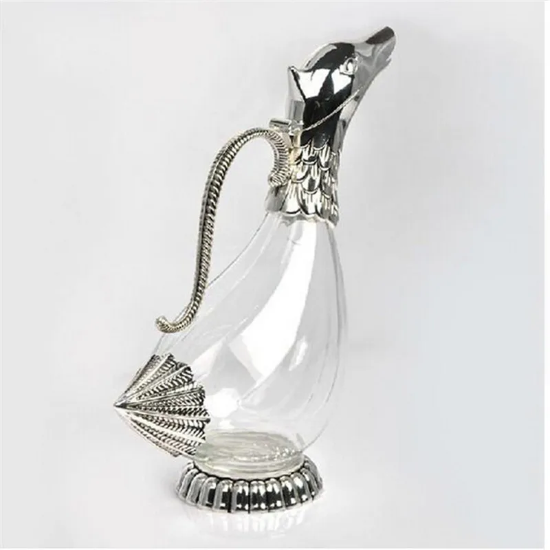 Elegant originality design silver plated finish metal glass decanter creative drinking vessel duck shape wine decanters as gifts
Elegant originality design silver plated finish metal glass decanter creative drinking vessel duck shape wine decanters as gifts