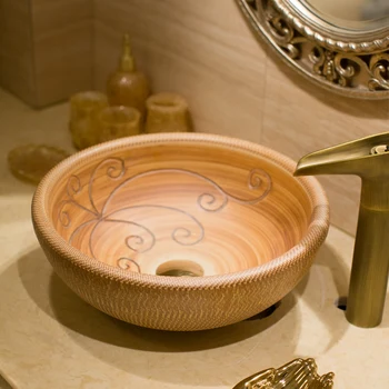 Jingdezhen Ceramic Basin Washbasin Artistic brown carving round ceramic wash basin bathroom sink
Jingdezhen Ceramic Basin Washbasin Artistic brown carving round ceramic wash basin bathroom sink