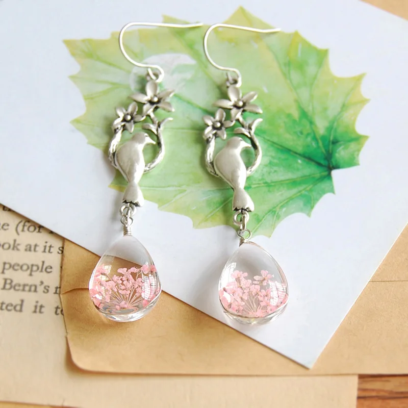 Boho Elegant Prevent Allergy Terrarium Dried Flower Narcissus Bird Long Drop Earrings Women Charm Floating Locket Jewelry Women
Boho Elegant Prevent Allergy Terrarium Dried Flower Narcissus Bird Long Drop Earrings Women Charm Floating Locket Jewelry Women
