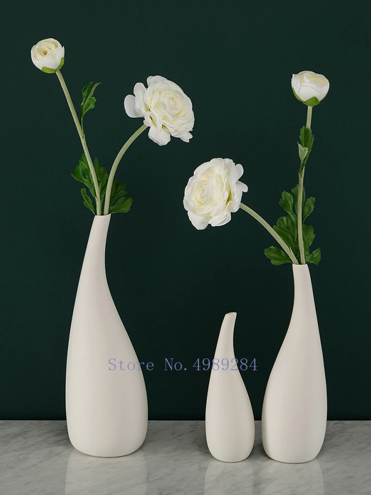 modern Drop type White ceramic Flower vase Hydroponic flower arrangement Decoration living room Home Decoration Retro
modern Drop type White ceramic Flower vase Hydroponic flower arrangement Decoration living room Home Decoration Retro
