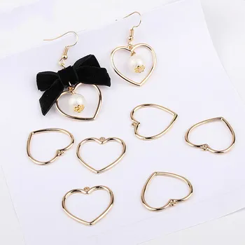 New homemade DIY Korean version temperament earrings material simple peach heart love belt ring accessories
New homemade DIY Korean version temperament earrings material simple peach heart love belt ring accessories