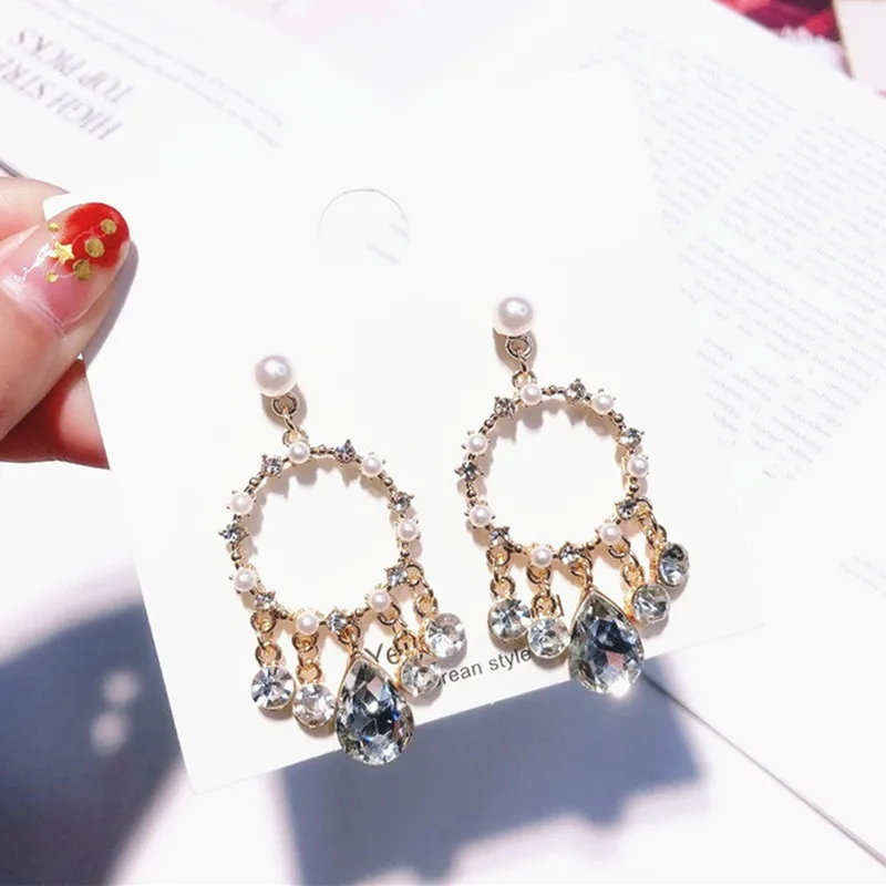 Fashion New Simulated Pearl Rhinestone Circle Earrings Jewelry Statement Women Water Drop Crystal Tassel Party Pendientes 5B2014
Fashion New Simulated Pearl Rhinestone Circle Earrings Jewelry Statement Women Water Drop Crystal Tassel Party Pendientes 5B2014