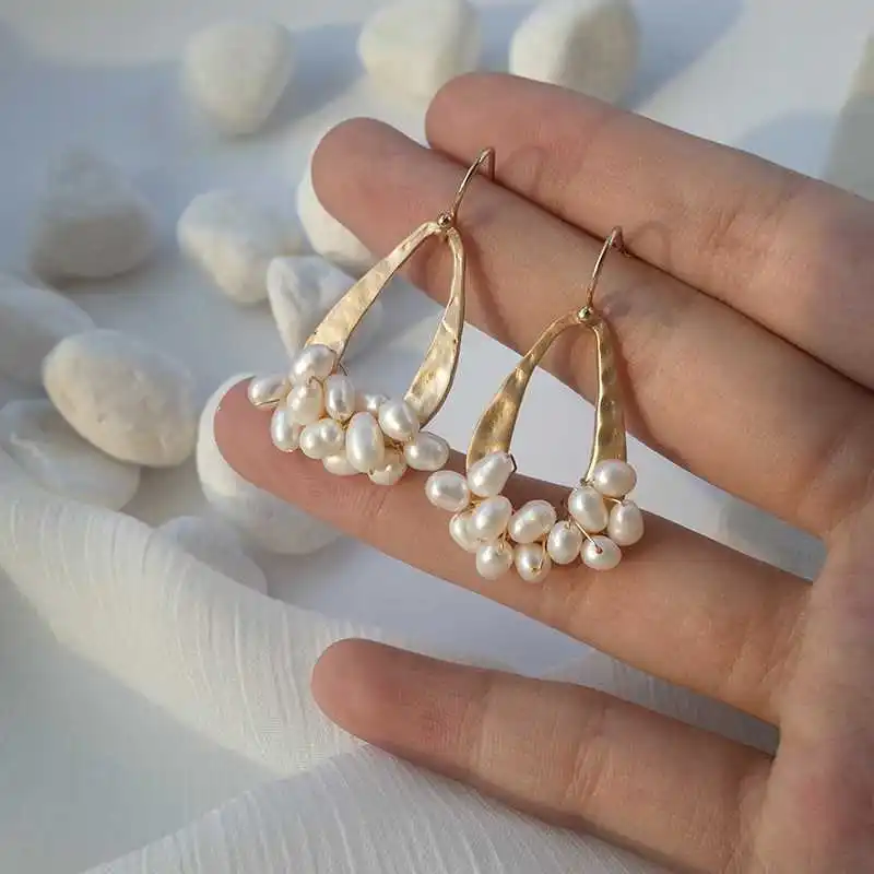 Cold wind natural freshwater pearl earrings matte geometry water drop earrings show thin face
Cold wind natural freshwater pearl earrings matte geometry water drop earrings show thin face