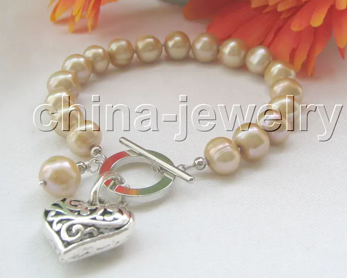 Beautiful 8" 10mm Champagne round freshwater pearl bracelet-GP clasp@^Noble style Natural Fine jewe SHIPPING 6.2 6.02
Beautiful 8" 10mm Champagne round freshwater pearl bracelet-GP clasp@^Noble style Natural Fine jewe SHIPPING 6.2 6.02