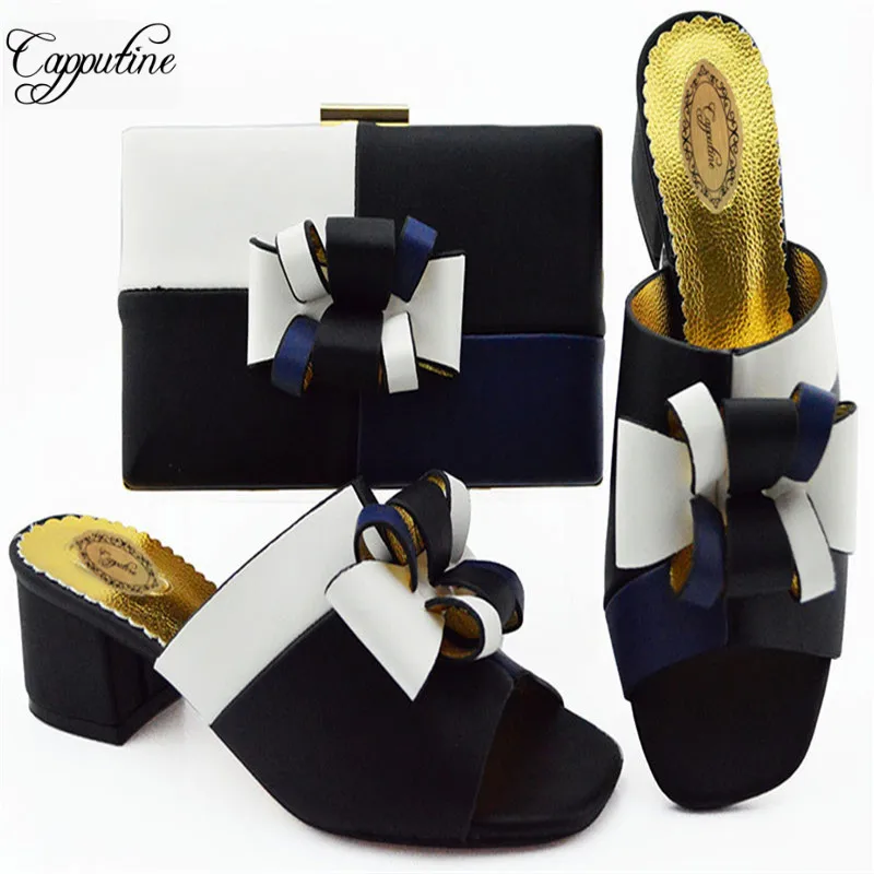 Italian Design PU Black Color Simple Ladies Shoes And Bag Set Fashion Middle Heels Shoes And Bag Set For Party Size 38-43 M1086
Italian Design PU Black Color Simple Ladies Shoes And Bag Set Fashion Middle Heels Shoes And Bag Set For Party Size 38-43 M1086
