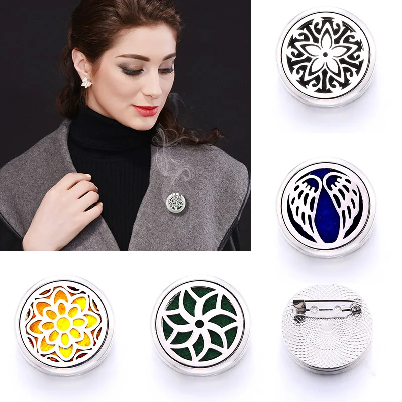 10 styles 20mm Stainless Steel Brooch Aromatherapy Perfume Tree of life angel wings Essential Oil Diffuser Locket Brooches
10 styles 20mm Stainless Steel Brooch Aromatherapy Perfume Tree of life angel wings Essential Oil Diffuser Locket Brooches
