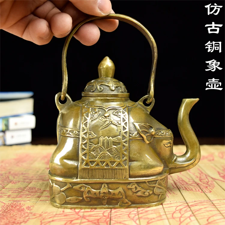 Copper copper kettle elephant Lucky Elephant antique teapot pot old crafts home auspicious ornaments
Copper copper kettle elephant Lucky Elephant antique teapot pot old crafts home auspicious ornaments