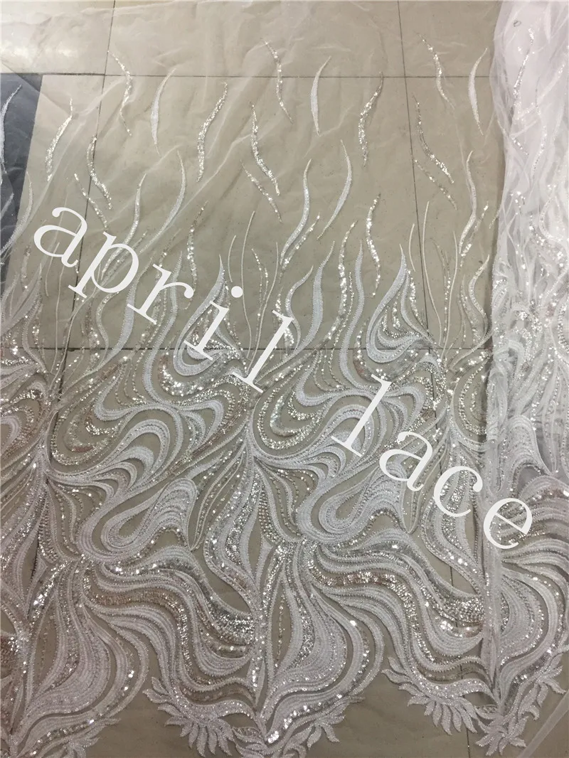 5 yards /lot A16 offwhite/dark blue sequin beads hand made mesh luxury lace fabric for wedding dress/sawing
5 yards /lot A16 offwhite/dark blue sequin beads hand made mesh luxury lace fabric for wedding dress/sawing