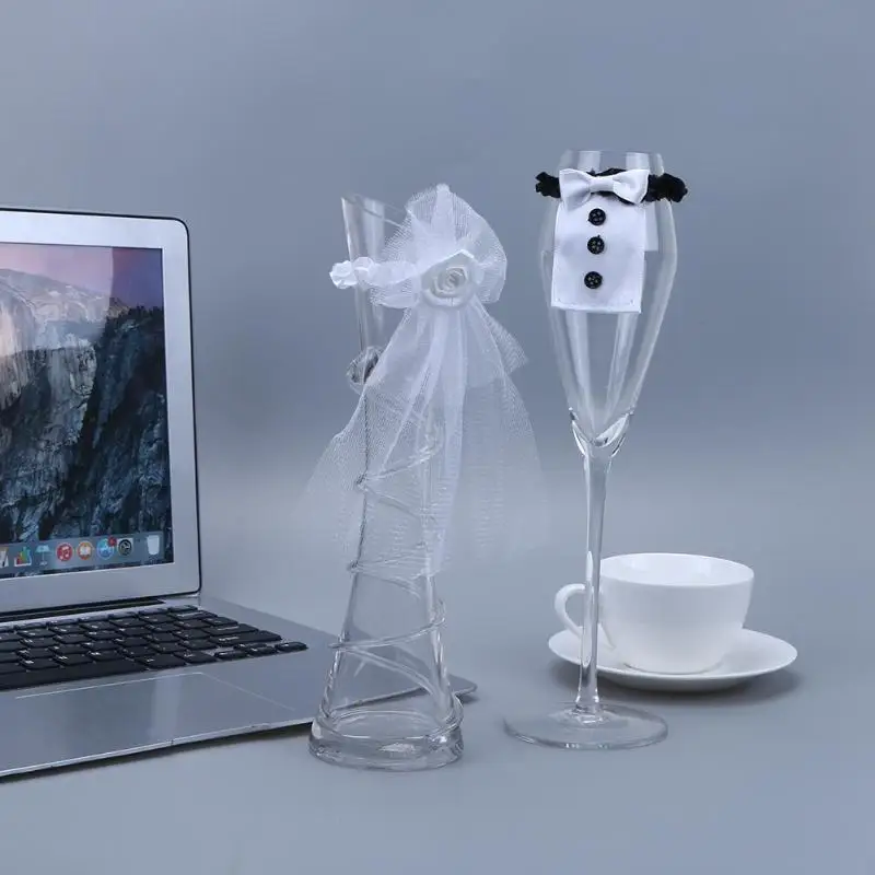 2Pcs/set Wedding Wine Glass Cups Set Covers Bride&Groom Costume Glass Decoration Wedding Part Holiday Cup Accessories
2Pcs/set Wedding Wine Glass Cups Set Covers Bride&Groom Costume Glass Decoration Wedding Part Holiday Cup Accessories