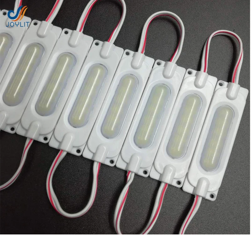 1000pcs/lot Injection Molding 2w DC 24V COB LED Modules with pc cover red blue Warm White Used For Advertising lamp bar light
1000pcs/lot Injection Molding 2w DC 24V COB LED Modules with pc cover red blue Warm White Used For Advertising lamp bar light