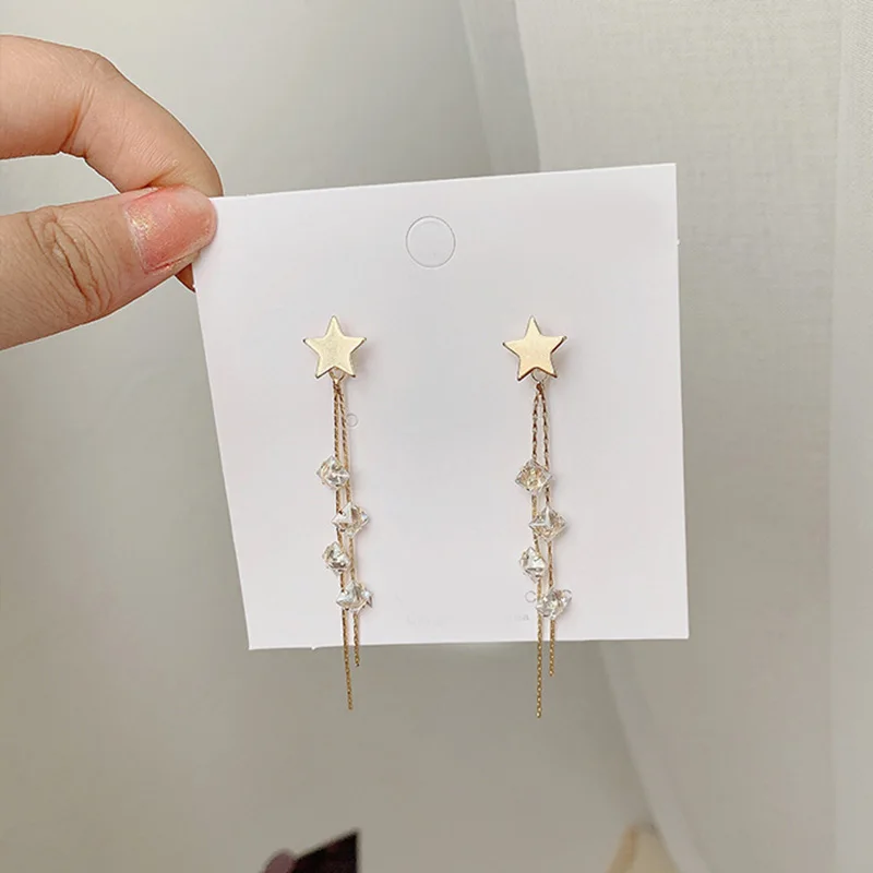 2019 new Japanese and Korean version of the temperament long zircon five-pointed star tassel fashion earrings ladies earrings
2019 new Japanese and Korean version of the temperament long zircon five-pointed star tassel fashion earrings ladies earrings