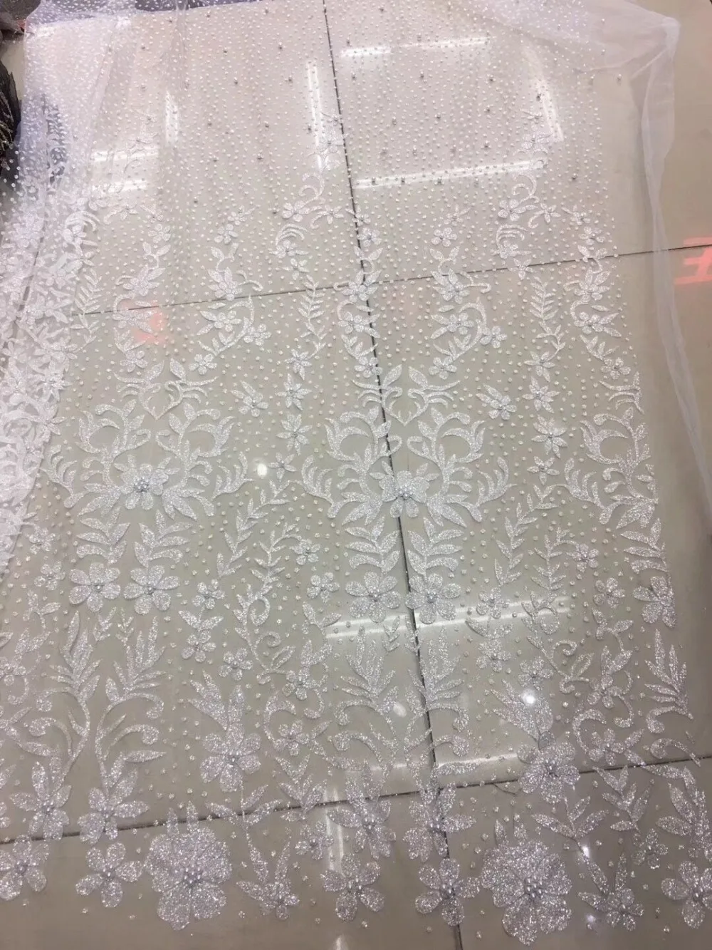 african glued glitter tulle lace fabric SYJ-1057 with beads Modern design for fashion dress
african glued glitter tulle lace fabric SYJ-1057 with beads Modern design for fashion dress