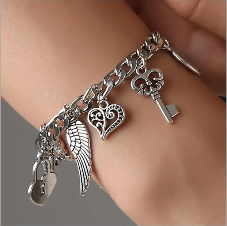 New Arrival Charm Bracelet Wings Elephant Heart Key Love Multielement Bracelet Brincos Bijoux Jewelry Gift B3015
New Arrival Charm Bracelet Wings Elephant Heart Key Love Multielement Bracelet Brincos Bijoux Jewelry Gift B3015