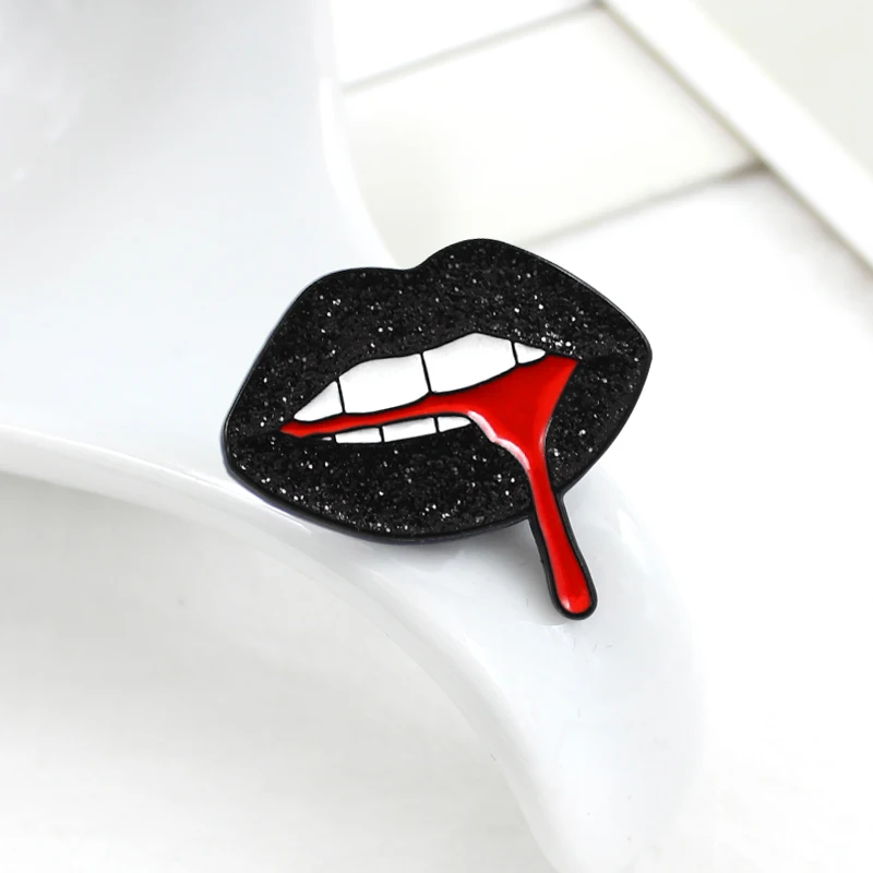 

Shiny black lips flowing out of red blood brooch Personality creative badge Shirt denim leather fashion accessories