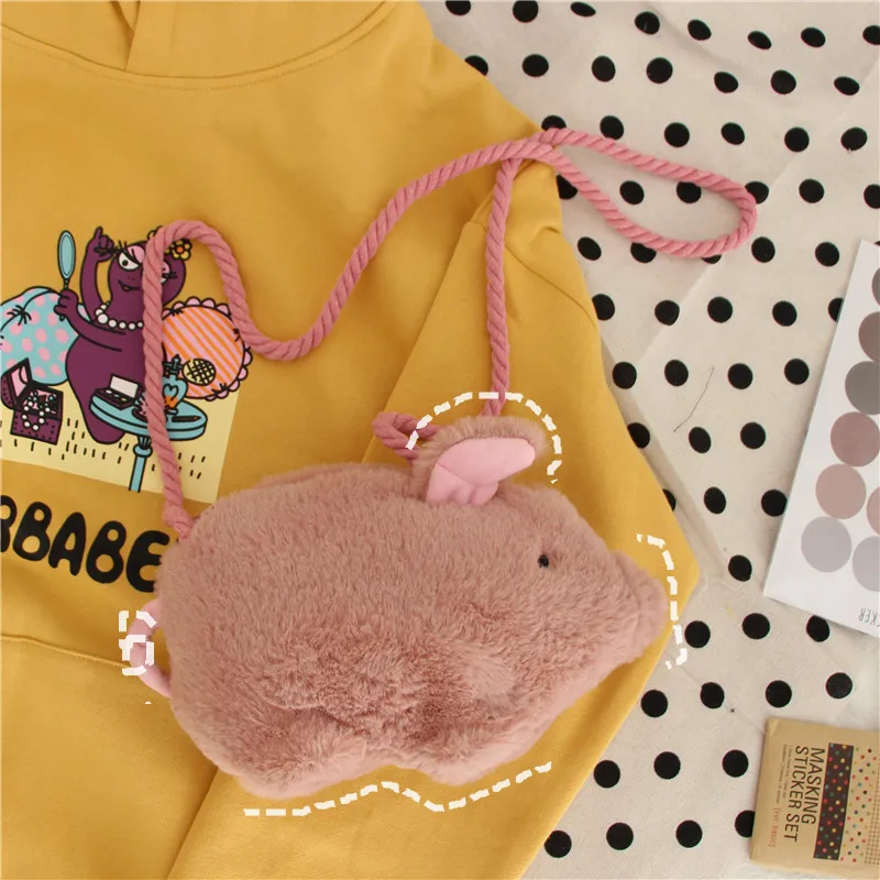 2019 New Korea pig bag cartoon pig bag female messenger bag cute ugly cute doll plush leisure pig bag
2019 New Korea pig bag cartoon pig bag female messenger bag cute ugly cute doll plush leisure pig bag