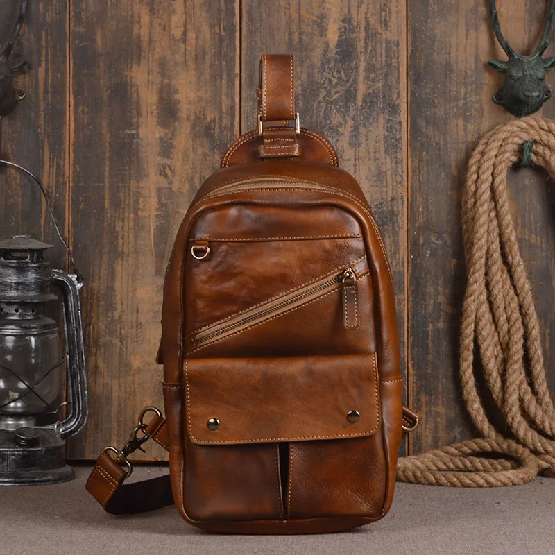 Retro personality men's first layer vegetable tanned leather close-fitting small chest bag handmade red ladies Messenger bag
Retro personality men's first layer vegetable tanned leather close-fitting small chest bag handmade red ladies Messenger bag