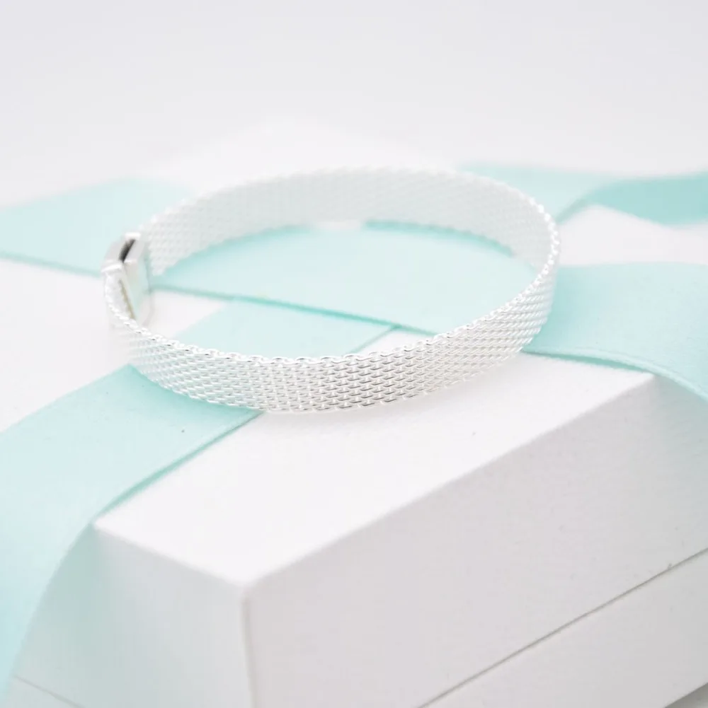 Hot sell fashion Style 925 Sterling Silver Reflexions Bracelet Fit Original pan Reflexions Charm bracelet DIY Jewelry
Hot sell fashion Style 925 Sterling Silver Reflexions Bracelet Fit Original pan Reflexions Charm bracelet DIY Jewelry