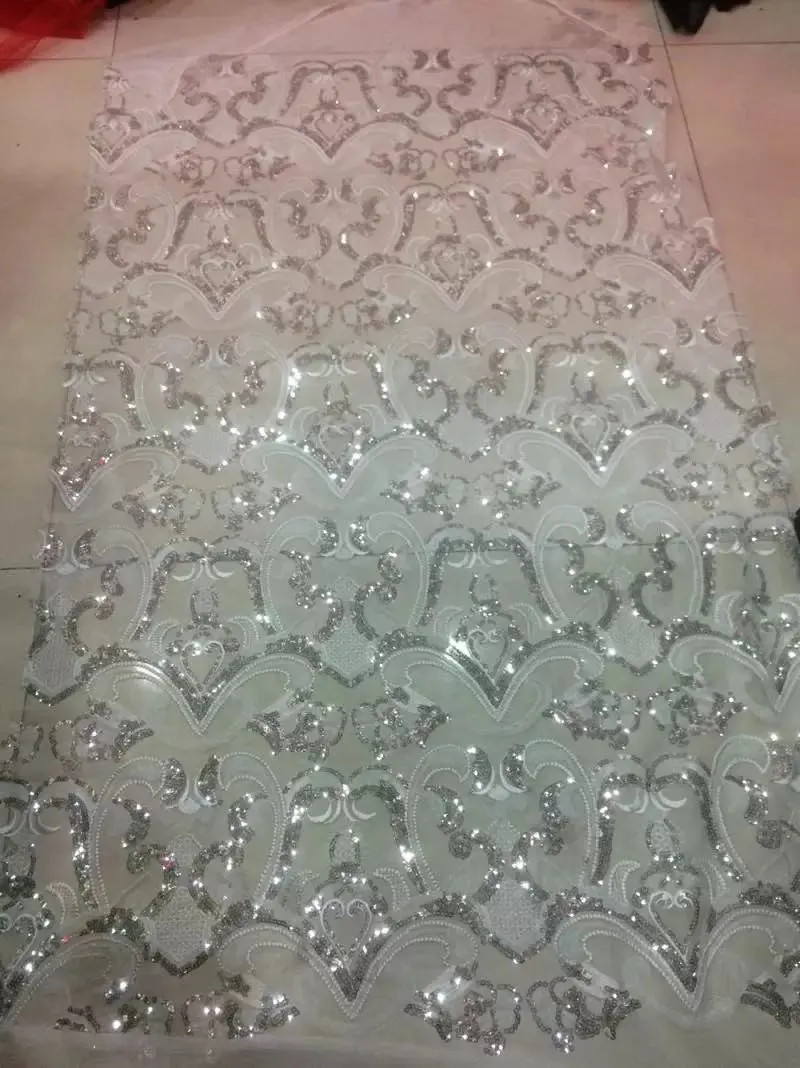 Wholesale tulle lace fabrics with sequins for Nigerian wedding, French lace fabric with large sequins
Wholesale tulle lace fabrics with sequins for Nigerian wedding, French lace fabric with large sequins