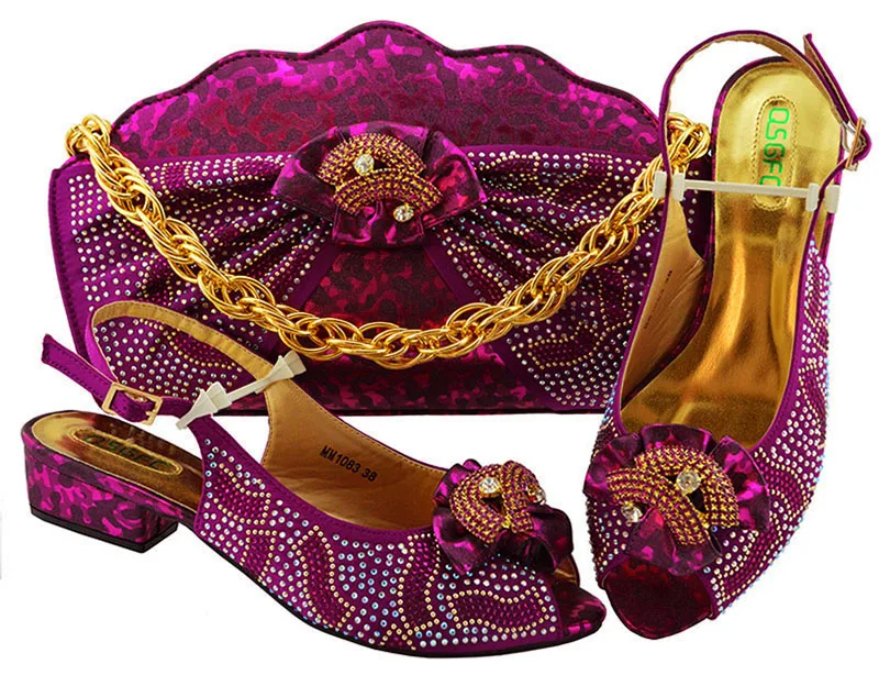 Low heel magenta italian shoes and bag with many stones size 38 to 43 african aso ebi party shoes and bag matching set SB8308-4
Low heel magenta italian shoes and bag with many stones size 38 to 43 african aso ebi party shoes and bag matching set SB8308-4