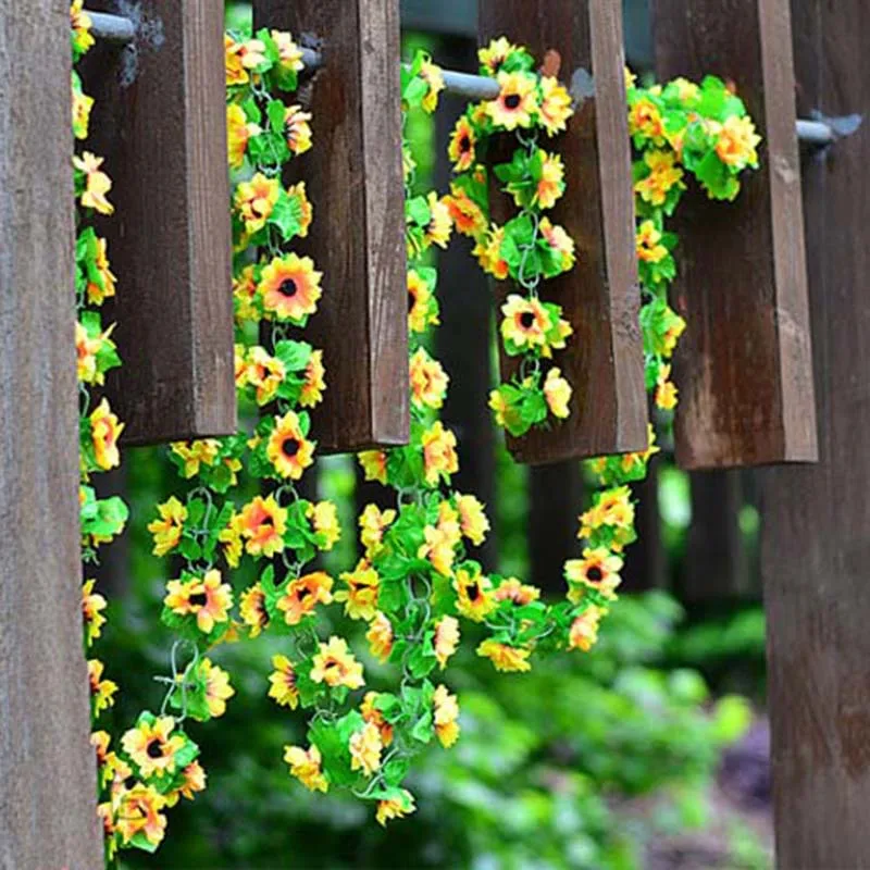Vivid Fake Silk Sunflower Ivy Vine Artificial Flowers With Green Leaves Hanging Garland Garden Fences Home Wedding Decoration
Vivid Fake Silk Sunflower Ivy Vine Artificial Flowers With Green Leaves Hanging Garland Garden Fences Home Wedding Decoration