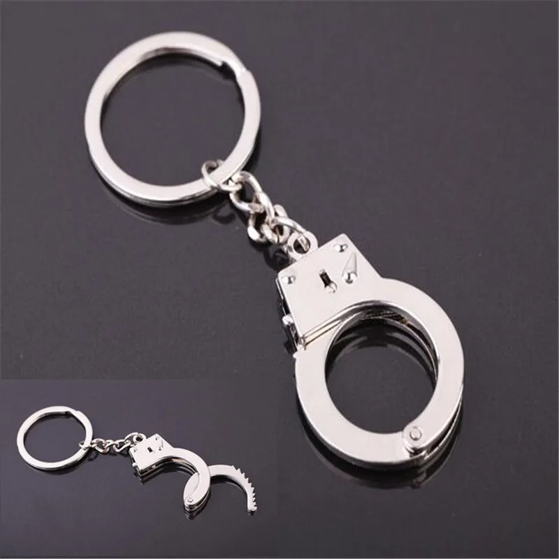 2017 Creative police man Handcuff Keychain Charms Pendant Car Key Keyring Handbag Key Chain Chaveiro
2017 Creative police man Handcuff Keychain Charms Pendant Car Key Keyring Handbag Key Chain Chaveiro