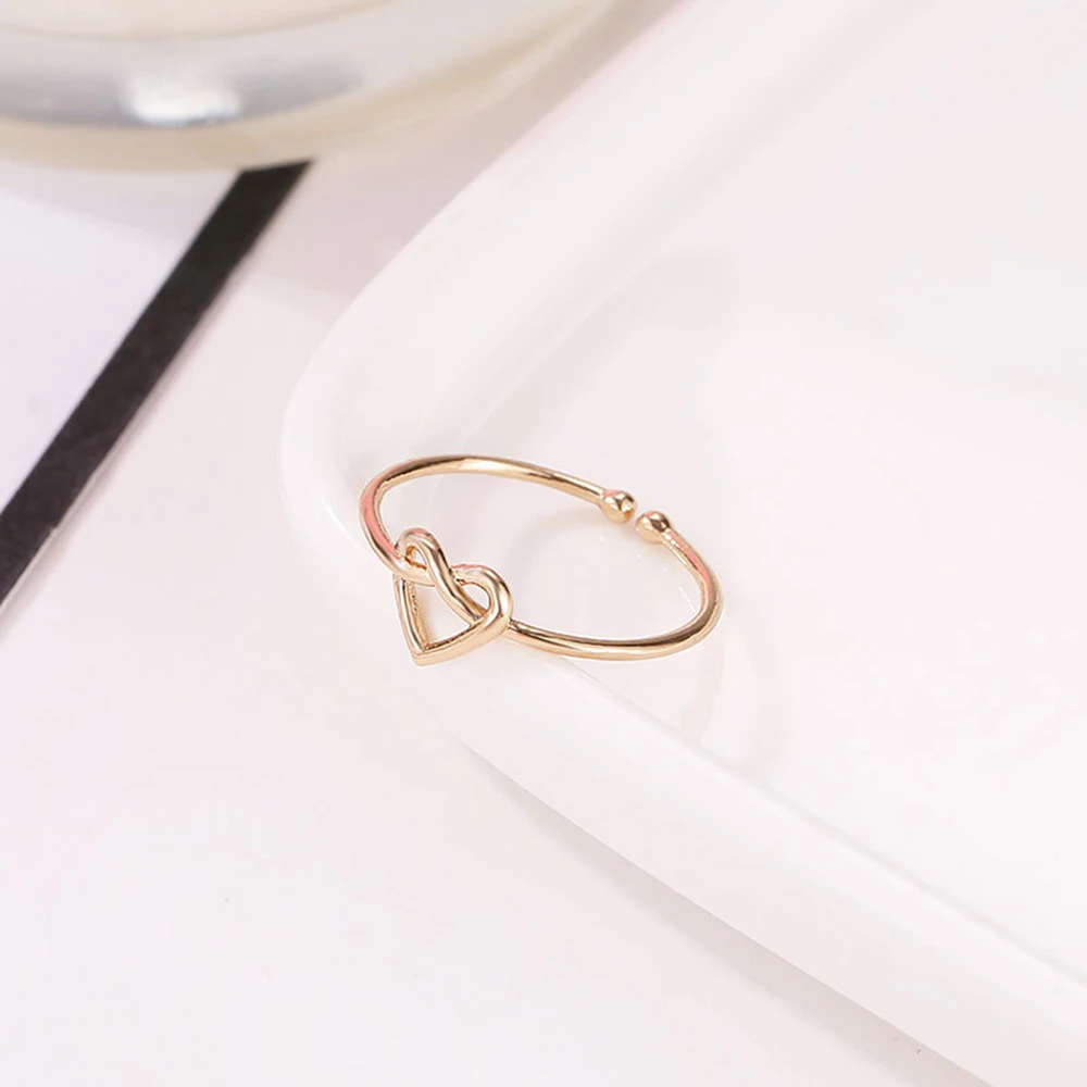 Love Testimony Heart Shape Hollow Ring Simple Style Temperament Knotted Rings Adjustable Size
Love Testimony Heart Shape Hollow Ring Simple Style Temperament Knotted Rings Adjustable Size