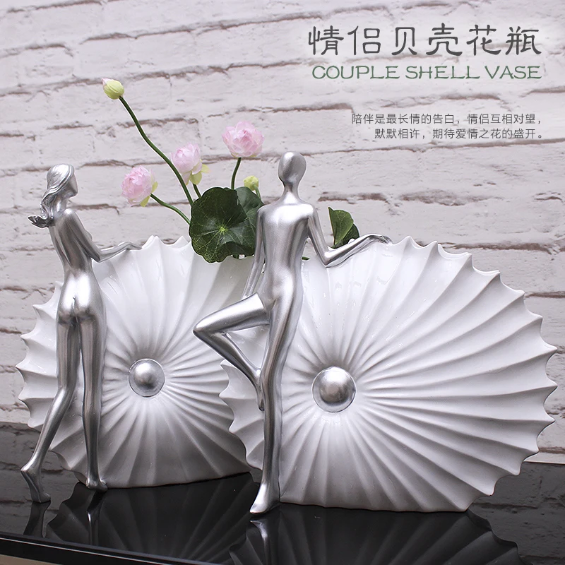 The simplicity of modern high-grade shell wave couples living room TV cabinet Home Furnishing Vase Decoration decoration poppy
The simplicity of modern high-grade shell wave couples living room TV cabinet Home Furnishing Vase Decoration decoration poppy