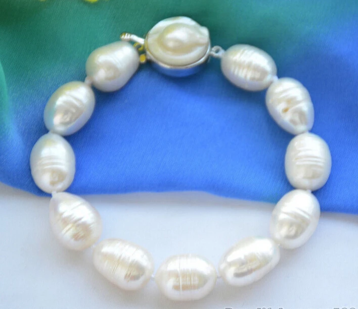 A 14mm NATURE white RICE freshwater pearl BRACELET 8inch (Z6329) 
A 14mm NATURE white RICE freshwater pearl BRACELET 8inch (Z6329)