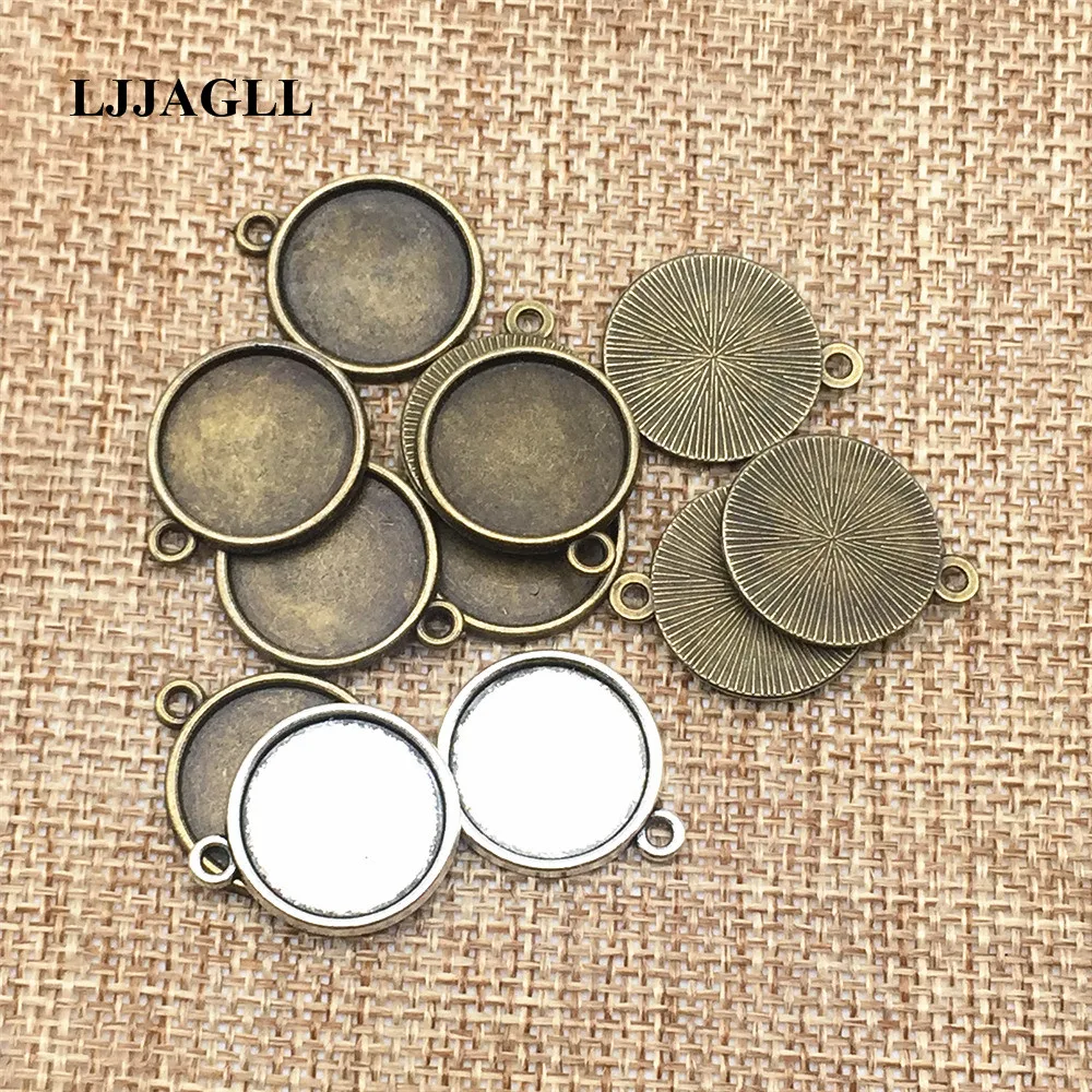 LJJAGLL 50pcs/lot Tow Colors Metal Cameo Base 19*22mm(Fit 16mm dia) Round Cabochon Pendant Blank Setting Jewelry Finding AXDT125
LJJAGLL 50pcs/lot Tow Colors Metal Cameo Base 19*22mm(Fit 16mm dia) Round Cabochon Pendant Blank Setting Jewelry Finding AXDT125