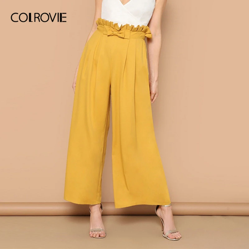 COLROVIE Yellow Solid Bow Paperbag Waist Fold Pleated Wide Leg Elegant Women Pants 2019 Elastic Waist Office Ladies Trousers 
COLROVIE Yellow Solid Bow Paperbag Waist Fold Pleated Wide Leg Elegant Women Pants 2019 Elastic Waist Office Ladies Trousers