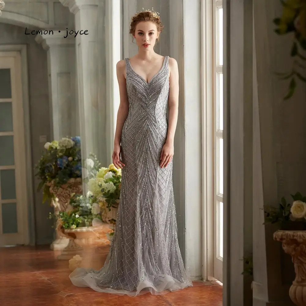 Lemon joyce Gray Evening Dresses Long 2019 Sexy V-neck Backless Beading Party Gowns Plus Size robe de soiree
Lemon joyce Gray Evening Dresses Long 2019 Sexy V-neck Backless Beading Party Gowns Plus Size robe de soiree
