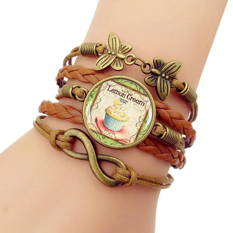 Handmade Knitted Leather bracelet Glass Cabochon Bracelet Vintage Cupcake Girls Braided Wristband Bracelet birthday present
Handmade Knitted Leather bracelet Glass Cabochon Bracelet Vintage Cupcake Girls Braided Wristband Bracelet birthday present