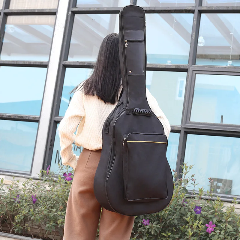 41 Inch Premium Electric Guitar Gig Bag Backpack Soft Case Cover Water-Resistant Nonwovens Interior Thicken Sponge Pad with Pock
41 Inch Premium Electric Guitar Gig Bag Backpack Soft Case Cover Water-Resistant Nonwovens Interior Thicken Sponge Pad with Pock