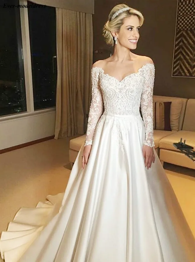 Off Shoulder Long Sleeves Wedding Dresses 2019 A-line Satin Lace Appliques Button Back Bridal Gowns Plus Size Vestido De Noiva
Off Shoulder Long Sleeves Wedding Dresses 2019 A-line Satin Lace Appliques Button Back Bridal Gowns Plus Size Vestido De Noiva