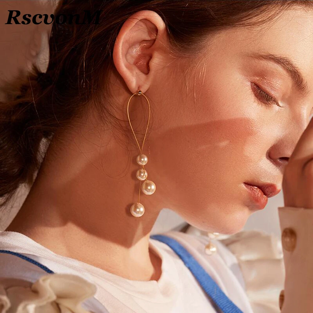 RscvonM Elegant Pendientes Flecos Women Long Earring CZ Pearl Charm Pendent Snake Chain Tassel Earring Bridal Wedding Jewelry
RscvonM Elegant Pendientes Flecos Women Long Earring CZ Pearl Charm Pendent Snake Chain Tassel Earring Bridal Wedding Jewelry